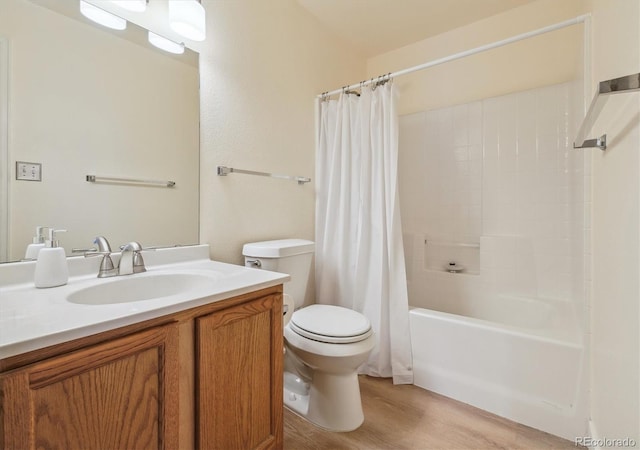 3847 Mossy Rock Dr Unit 104, Highlands Ranch, CO 80126 - bathroom featuring wood finished floors, toilet, vanity, and shower / bath combination with curtain