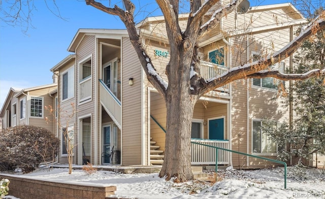 3847 Mossy Rock Dr Unit 104, Highlands Ranch, CO 80126 - view of snow covered property