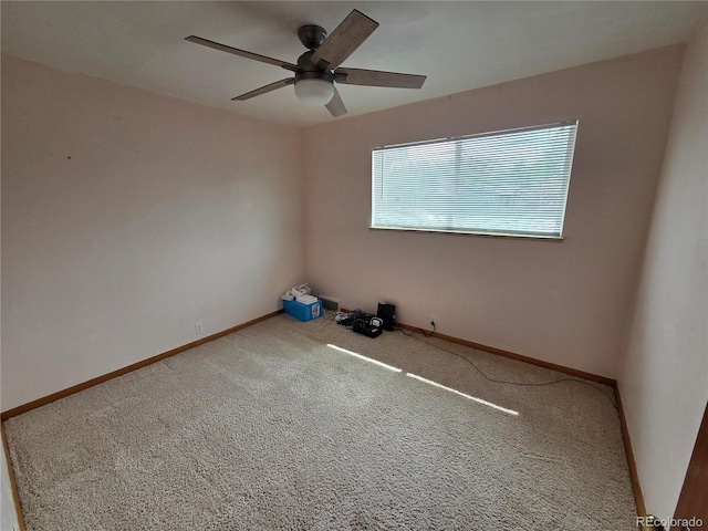 820 Walnut St, Julesburg, CO 80737 - carpeted empty room featuring a ceiling fan and baseboards
