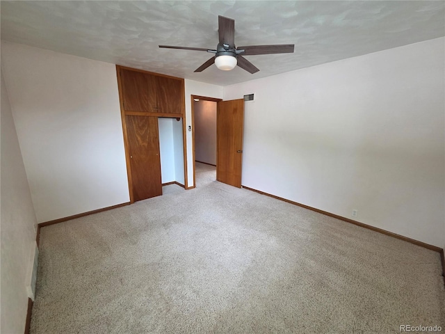 820 Walnut St, Julesburg, CO 80737 - unfurnished bedroom featuring light carpet, baseboards, and a closet
