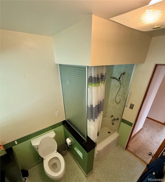 820 Walnut St, Julesburg, CO 80737 - full bathroom featuring shower / tub combo, baseboards, and toilet