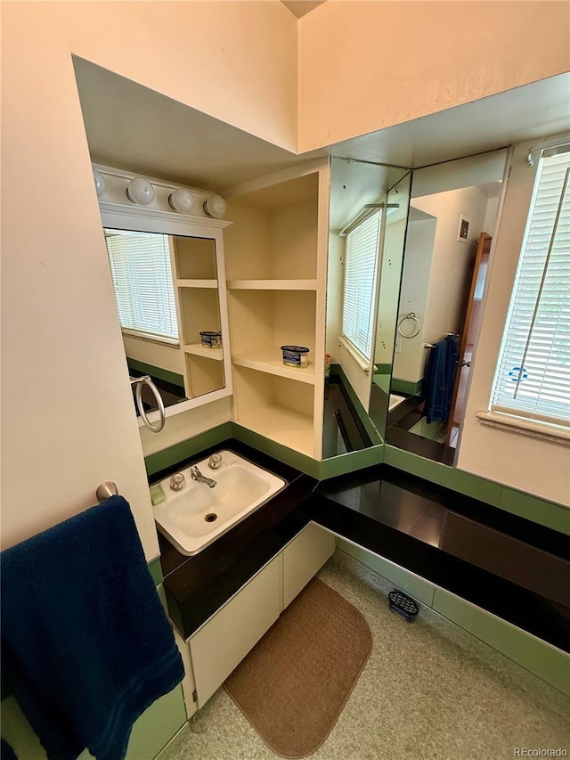 820 Walnut St, Julesburg, CO 80737 - bathroom featuring healthy amount of natural light and vanity