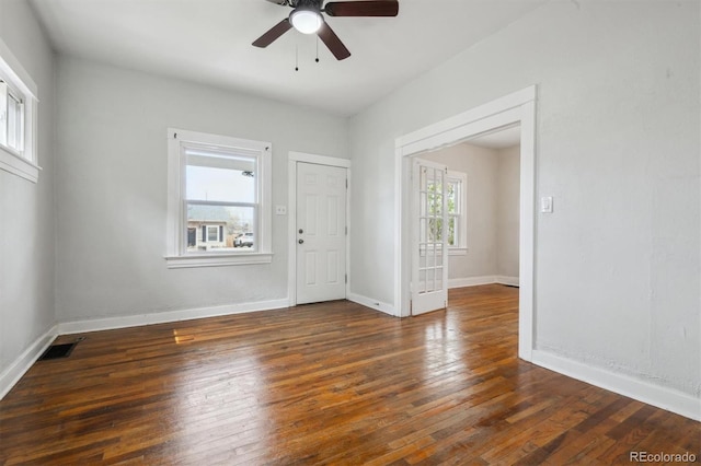 4046 S Bannock St, Englewood, CO 80110 - spare room with hardwood / wood-style floors, visible vents, baseboards, and a ceiling fan
