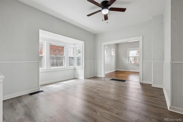 4046 S Bannock St, Englewood, CO 80110 - spare room with visible vents, baseboards, wood finished floors, and ceiling fan