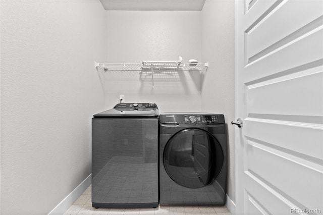 6700 Clay St, Denver, CO 80221 - laundry area with independent washer and dryer and baseboards