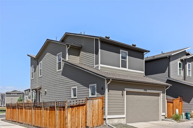 6700 Clay St, Denver, CO 80221 - view of front of property with an attached garage and concrete driveway