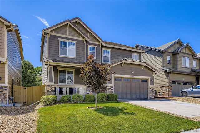 12631 Glencoe St, Thornton, CO 80241 - craftsman-style house with stone siding, concrete driveway, a garage, and a porch