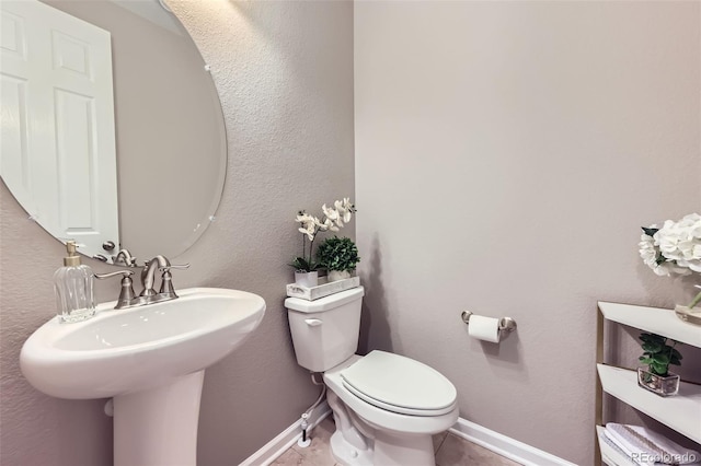 12631 Glencoe St, Thornton, CO 80241 - half bath featuring toilet and a sink