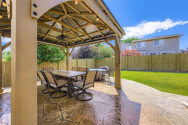 12631 Glencoe St, Thornton, CO 80241 - fenced backyard featuring a gazebo, a patio, and outdoor dining space
