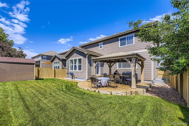 12631 Glencoe St, Thornton, CO 80241 - back of house with a gazebo, a patio, and a fenced backyard