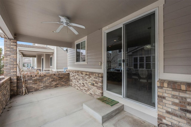 view of patio with ceiling fan