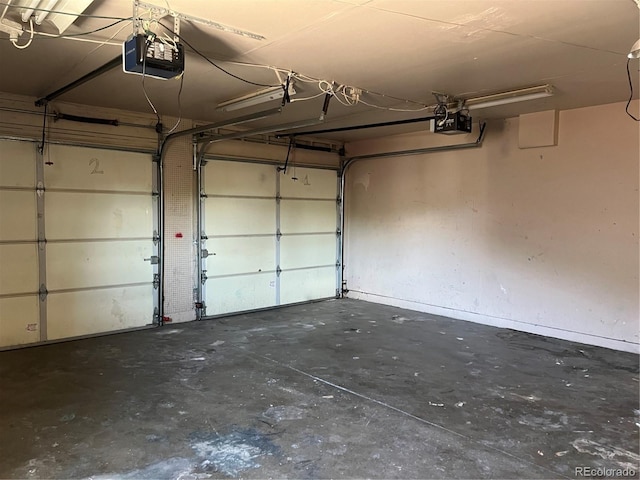 12252 Elmendorf Pl, Denver, CO 80239 - garage with a garage door opener