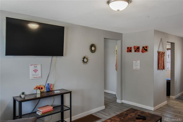 corridor featuring hardwood / wood-style floors