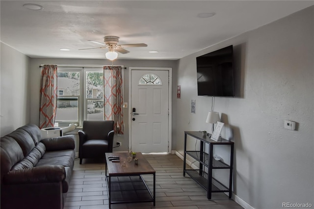 living room with ceiling fan