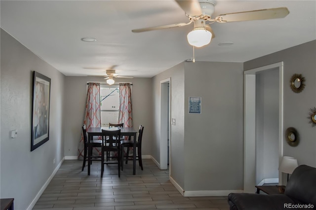 dining space featuring ceiling fan