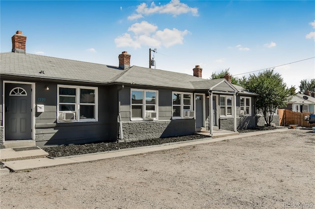 view of front of home featuring cooling unit