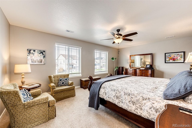 bedroom with carpet, a ceiling fan, and baseboards