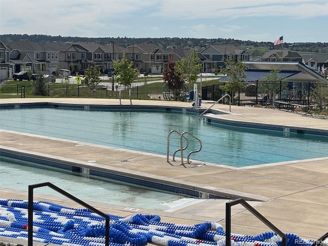 17955 Sky Pilot Ave, Parker, CO 80134 - community pool with a residential view and a patio