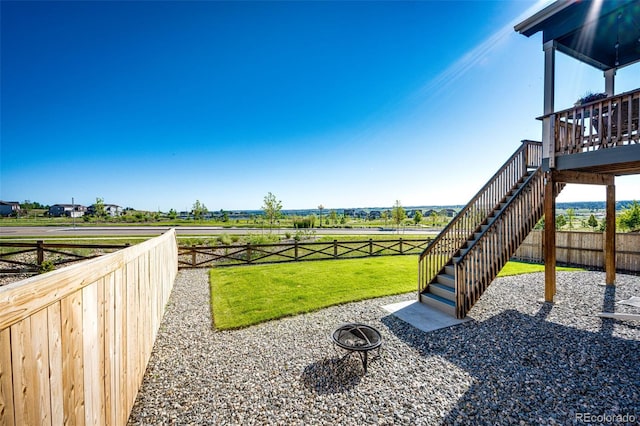 17955 Sky Pilot Ave, Parker, CO 80134 - fenced backyard with stairs and a wooden deck