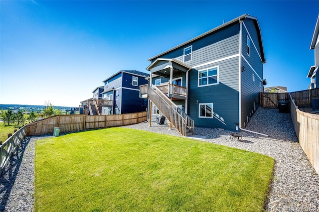 17955 Sky Pilot Ave, Parker, CO 80134 - rear view of property featuring a fenced backyard and stairs