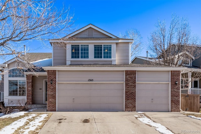 front facade with a garage