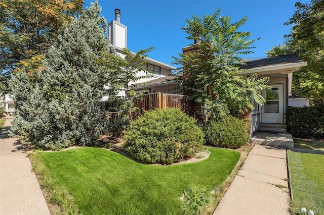 13 Nome Way Unit A, Aurora, CO 80012 - obstructed view of property with fence and a front yard