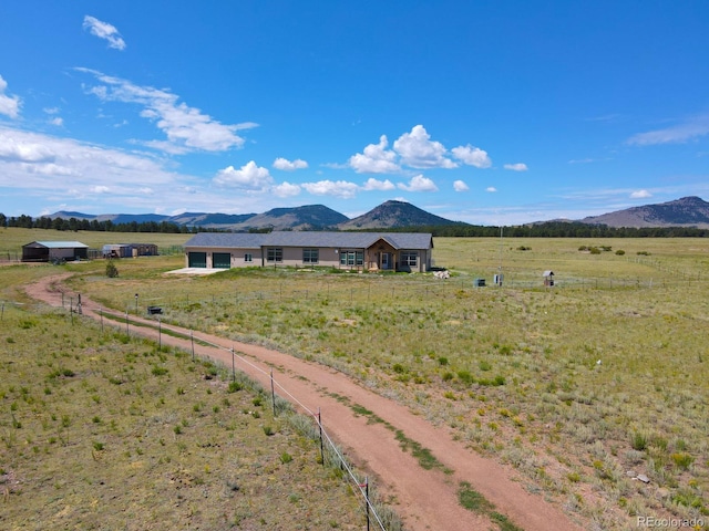 property view of mountains featuring a rural view