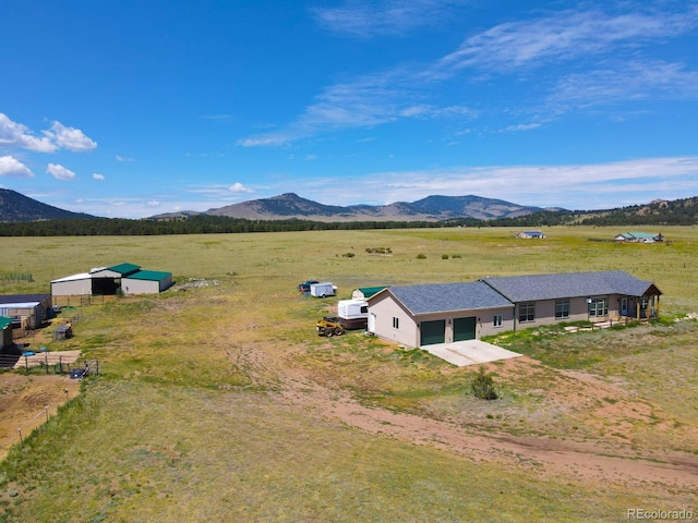 aerial view featuring a mountain view and a rural view