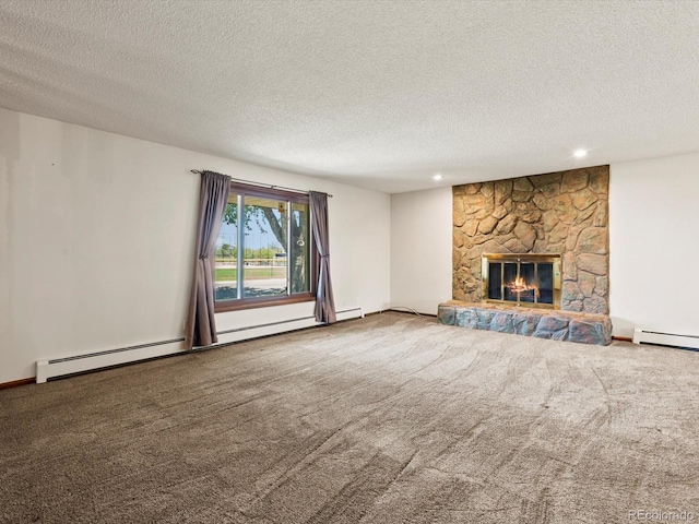 3780 W 66th Ave, Arvada, CO 80003 - unfurnished living room with carpet floors, a textured ceiling, a stone fireplace, recessed lighting, and a baseboard heating unit