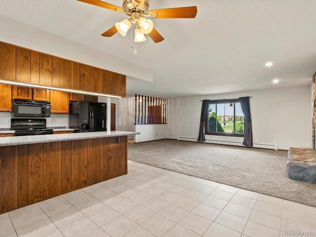 3780 W 66th Ave, Arvada, CO 80003 - kitchen with black appliances, light carpet, open floor plan, brown cabinetry, and a textured ceiling