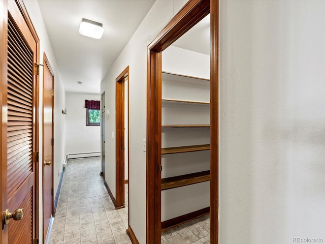 3780 W 66th Ave, Arvada, CO 80003 - hallway with a baseboard heating unit and baseboards