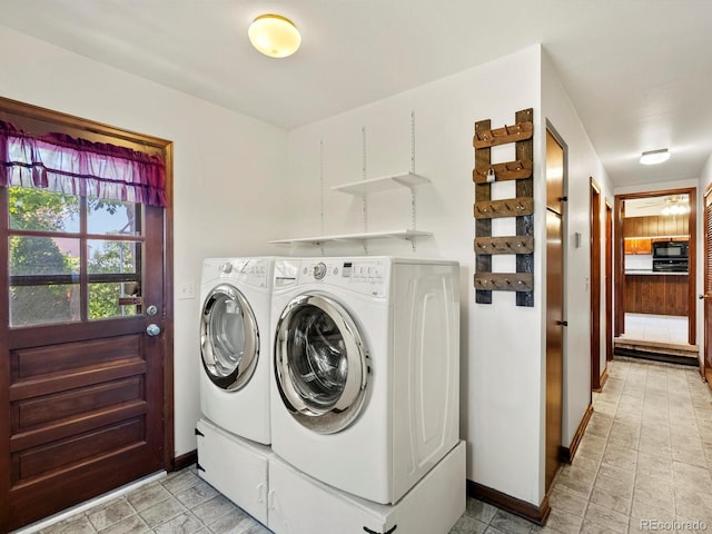 3780 W 66th Ave, Arvada, CO 80003 - laundry area featuring washer and clothes dryer and baseboards