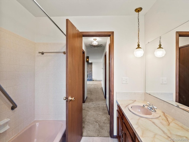 3780 W 66th Ave, Arvada, CO 80003 - full bath featuring vanity, washtub / shower combination, and tile patterned floors