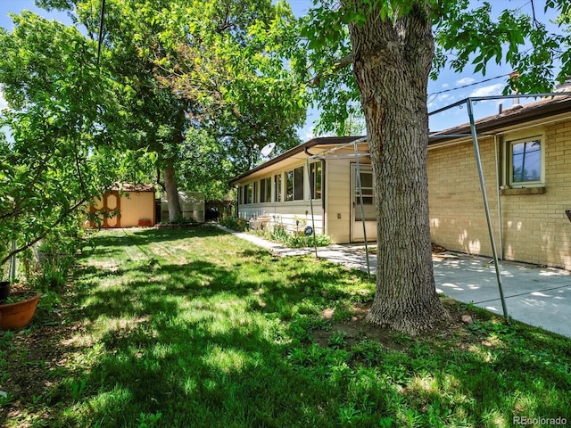 3780 W 66th Ave, Arvada, CO 80003 - view of yard featuring a patio