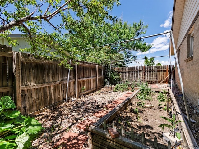 3780 W 66th Ave, Arvada, CO 80003 - fenced backyard with a garden