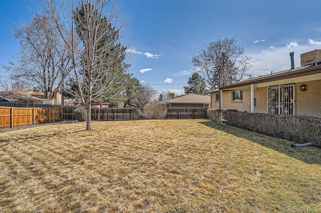 view of yard featuring a fenced backyard