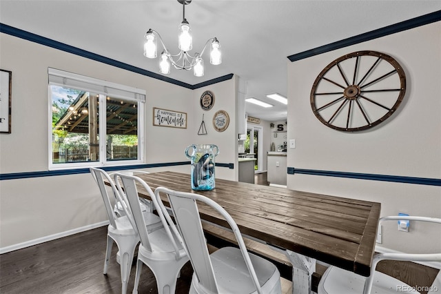 2066 Amber Ct, Erie, CO 80516 - dining room featuring a chandelier and wood finished floors