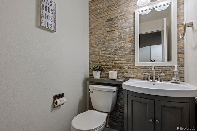 2066 Amber Ct, Erie, CO 80516 - half bathroom featuring vanity and toilet