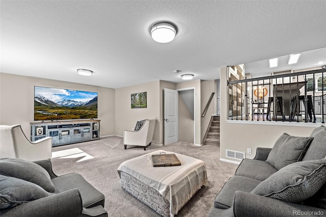 2066 Amber Ct, Erie, CO 80516 - carpeted living room with stairway and a textured ceiling