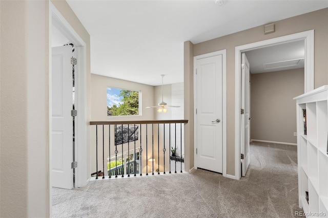 2066 Amber Ct, Erie, CO 80516 - hallway featuring carpet flooring and baseboards