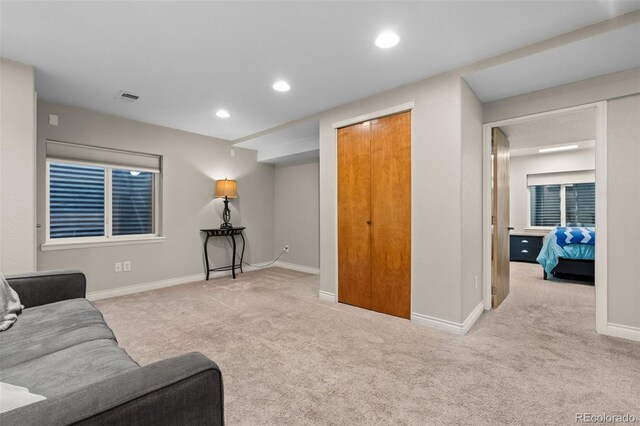 2066 Amber Ct, Erie, CO 80516 - carpeted living area with baseboards and recessed lighting