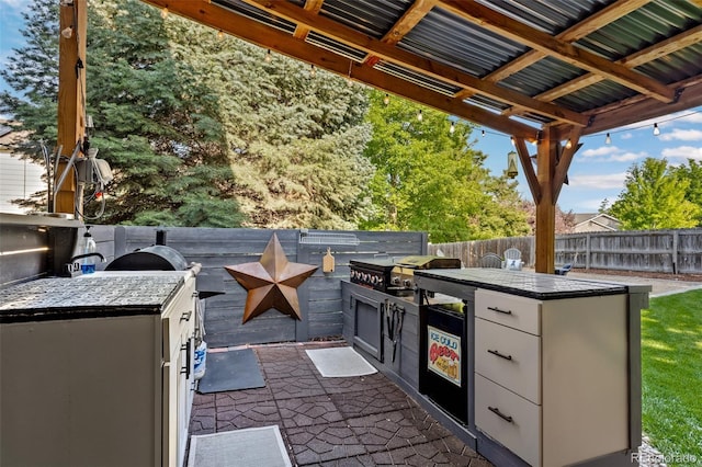 2066 Amber Ct, Erie, CO 80516 - view of patio with exterior kitchen
