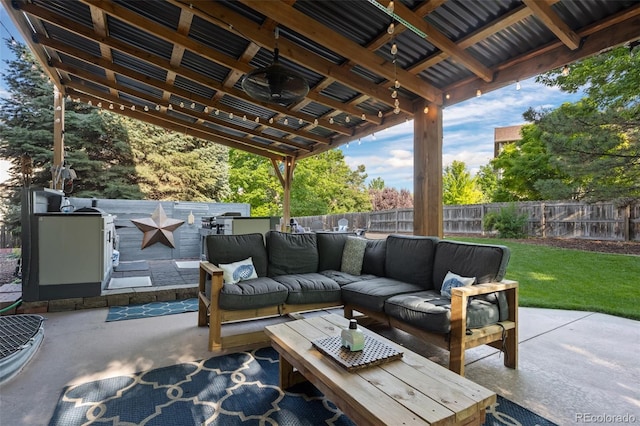 2066 Amber Ct, Erie, CO 80516 - fenced backyard with an outdoor living space, a patio area, and area for grilling