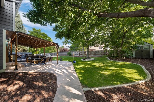 2066 Amber Ct, Erie, CO 80516 - fenced backyard featuring a pergola, a shed, a patio area, and an outdoor hangout area