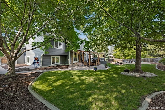 2066 Amber Ct, Erie, CO 80516 - fenced backyard with a patio area