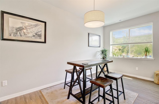 5477 Passport Vw, Colorado Springs, CO 80922 - dining space with baseboards and light wood-style floors