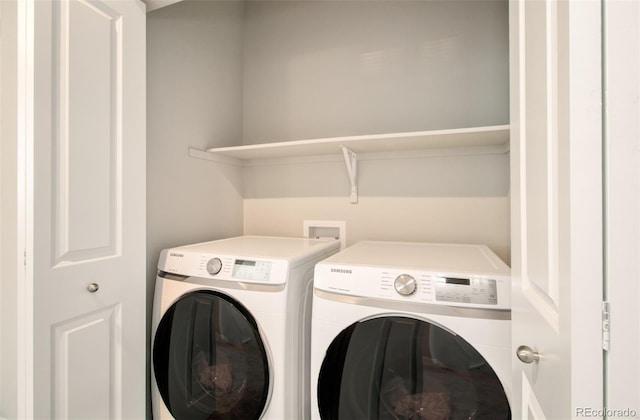 5477 Passport Vw, Colorado Springs, CO 80922 - washroom with washing machine and dryer