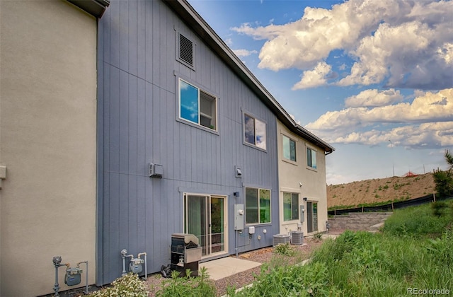 5477 Passport Vw, Colorado Springs, CO 80922 - rear view of property featuring central air condition unit