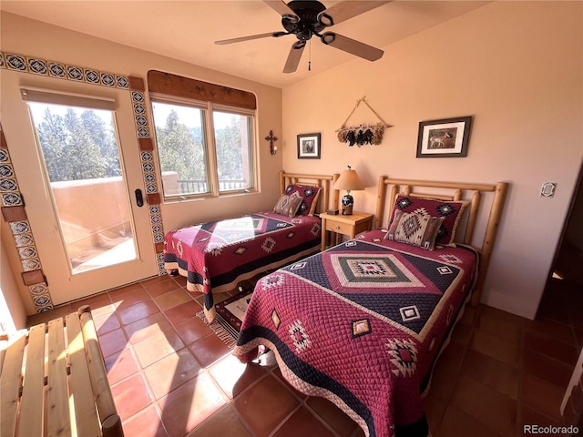 bedroom with tile patterned flooring and access to exterior