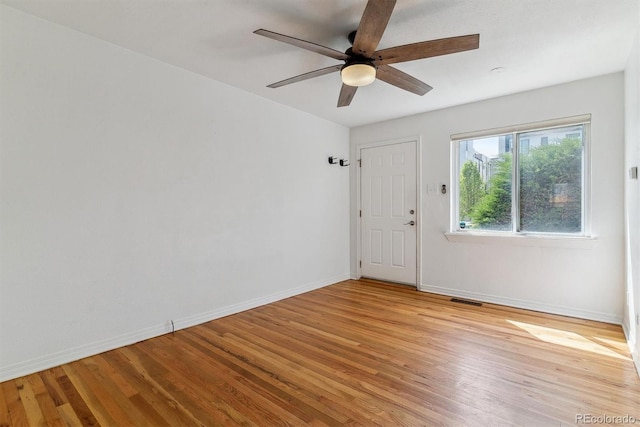 1804 Grove St, Denver, CO 80204 - empty room with ceiling fan, baseboards, visible vents, and light wood-style flooring
